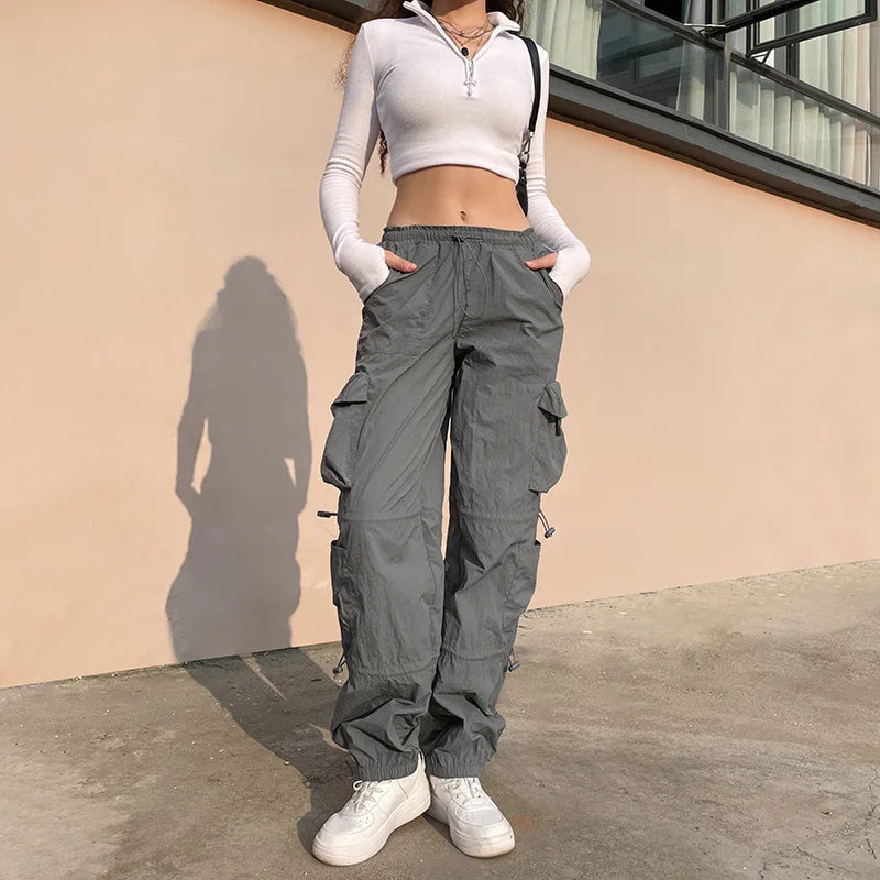 American street style design with multiple pockets, workwear with drawstring elastic and loose fit, hip-hop low waist sports pan